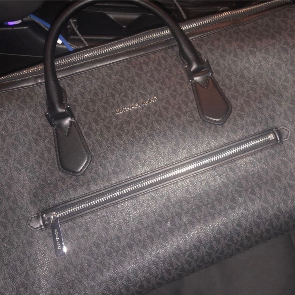 MK Black all over logo duffle bag